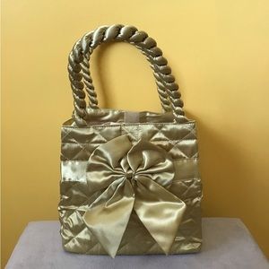 NWOT Gold Quilted bag
